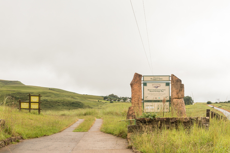 MALOTI DRAKENSBERG PARK, SOUTH AFRICA - MARCH 18, 2018: Entrance to the Rugged Glen Camp Site in the Maloti Drakensberg Park. Name boards are visibleのeditorial素材