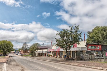 BERGVILLE, SOUTH AFRICA - MARCH 18, 2018: A street scene with businesses and vehicles in Bergville in the Kwazulu-Natal Provinceのeditorial素材