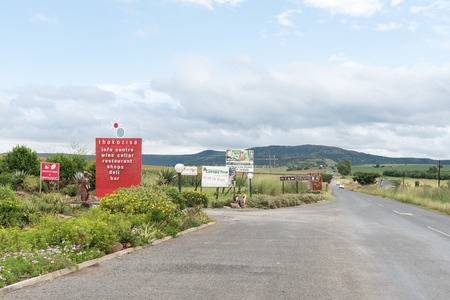 WINTERTON, SOUTH AFRICA - MARCH 18, 2018: The entrance to the Thokozisa Centre near Winterton on the road to Monks Cowl in the Kwazulu-Natal Drakensberg. Road signs are visibleのeditorial素材