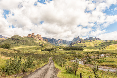 Garden Castle in the Drakensberg near Underberg. Hermits Wood Camp Site is visible between the trees in the back and the Mlambonja River to the right. Rhino Peak (3056m) is visibleのeditorial素材