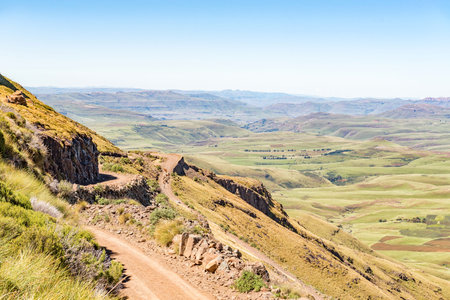 An aerial view of the Naudes Nek Pass in the Eastern Cape Province of South Africa. Cattle, a person...