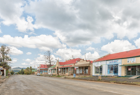 ZASTRON, SOUTH AFRICA - APRIL 1, 2018: A street scene with businesses, a vehicle and people, in Zastron in the Free State Provinceのeditorial素材