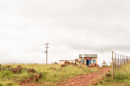 ZWELISHA, SOUTH AFRICA - MARCH 18, 2018: Unidentified people at a supermarket near Mkukwini, next to road P288 in the Kwazulu-Natal Drakensbergのeditorial素材