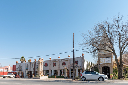 PARYS, SOUTH AFRICA, AUGUST 2, 2018: A street scene with decor shop and a guest house, in Parys in the Free State Province. Vehicles are visibleのeditorial素材