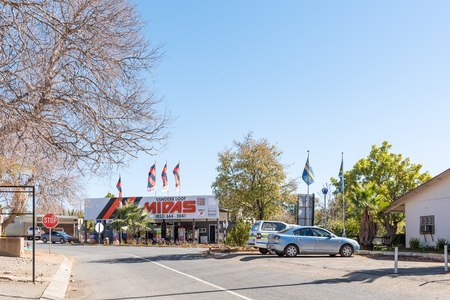 VANDERKLOOF, SOUTH AFRICA, AUGUST 6, 2018: A street scene with a business, gas station and vehicles, in Vanderkloof in the Northern Cape Provinceのeditorial素材