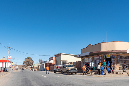 PHILLIPSTOWN, SOUTH AFRICA, AUGUST 6, 2018: A street scene, with businesses, people and vehicles, in Phillipstown in the Northern Cape Provinceのeditorial素材