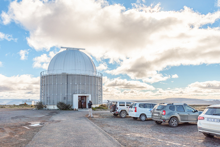 SUTHERLAND, SOUTH AFRICA, AUGUST 7, 2018: Building of the 40-inch telescope at the South African Astronomical Observatory near Sutherland. Vehicles and tourists are visibleのeditorial素材