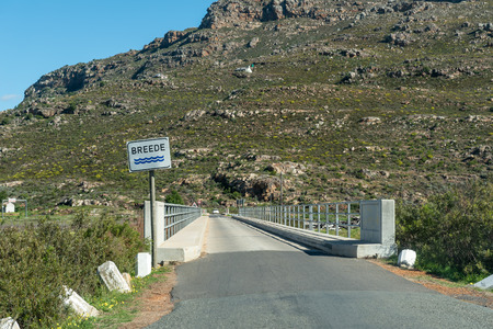 Single lane road bridge over the Breede River at the start of the Bains Kloof Pass in the Western Cape Provinceのeditorial素材