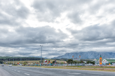 STELLENBOSCH, SOUTH AFRICA, AUGUST 16, 2018: The Mooiberge Farm Stall and strawberry farm near Stellenbosch in the Western Cape Province. Vehicles on road R44 are visibleのeditorial素材