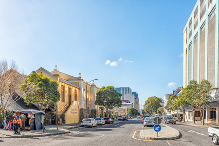 CAPE TOWN, SOUTH AFRICA, AUGUST 17, 2018: A view of Bree Street in Cape Town. The Love Thy Neighbour Restaurant, in an historic church, people and vehicles are visibleのeditorial素材
