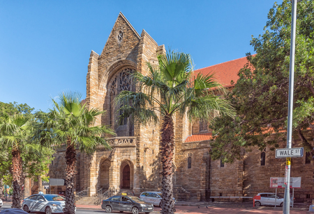CAPE TOWN, SOUTH AFRICA, AUGUST 17, 2018: A view of Wale Street with the St Georges Cathedral in the back. Vehicles and palm trees are visibleのeditorial素材