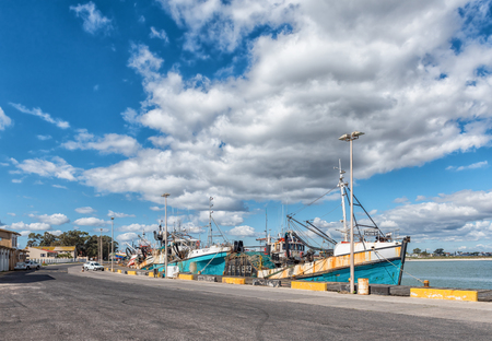 LAAIPLEK, SOUTH AFRICA, AUGUST 21, 2018: The harbor in the mouth of the Berg River in Laaiplek in the Western Cape Province of South Africa. Fishing boats are visibleのeditorial素材