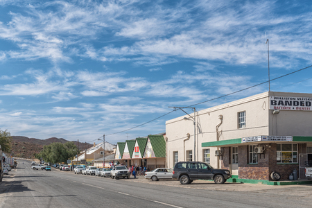 WILLISTON, SOUTH AFRICA, AUGUST 31, 2018: A street scene, with vehicles, people and businesses, in Williston in the Northern Cape Provinceのeditorial素材