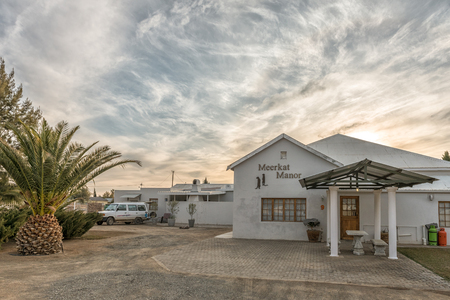 CARNAVON, SOUTH AFRICA, AUGUST 31, 2018: The Meerkat Manor Guest House in Carnavon in the Northern Cape Province. A vehicle is visible at the campsiteのeditorial素材