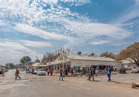 HOPETOWN, SOUTH AFRICA, SEPTEMBER 1, 2018: A street scene, with businesses, vehicles and people, in Hopetown in the Northern Cape Provinceのeditorial素材