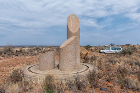 ORANIA, SOUTH AFRICA, SEPTEMBER 1, 2018:  The Irish Boer War Volunteer monument, on Monument Hill in Orania in the Northern Cape Province. A vehicle is visibleのeditorial素材