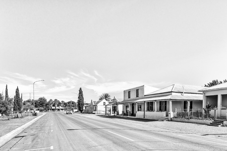 CALVINIA, SOUTH AFRICA, AUGUST 30, 2018: A street scene, with historic buildings, in Calvinia in the Northern Cape Province. Monochromeのeditorial素材