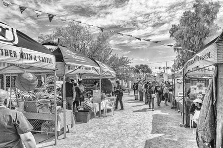 WILLISTON, SOUTH AFRICA, AUGUST 31, 2018: Stalls at the yearly Winter Festival in Williston in the Northern Cape Province. People are visible. Monochromeのeditorial素材