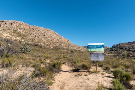 DWARSRIVIER, SOUTH AFRICA, AUGUST 23, 2018: An information board on the Bokveldskloof Trail to the Maltese Cross near Dwarsrivier in the Cederberg Mountainsのeditorial素材