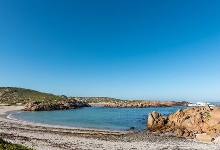 PATERNOSTER, SOUTH AFRICA, AUGUST 21, 2018: A view of Tietiesbaai Caravan Park in the Cape Columbine Nature Reserve near Paternoster. An ablution building and a motorhome are visibleのeditorial素材