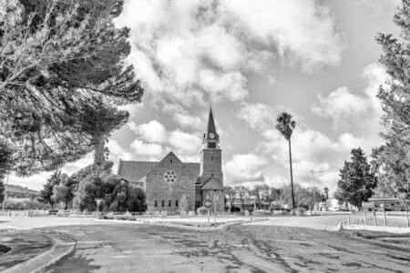 LOXTON, SOUTH AFRICA, AUGUST 7, 2018: A street scene, with the Dutch Reformed Church, in Loxton in the Northern Cape Province. Monochromeのeditorial素材
