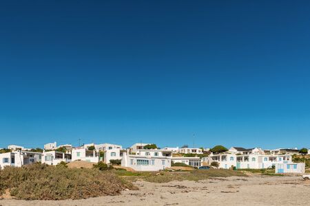 PATERNOSTER, SOUTH AFRICA, AUGUST 21, 2018: Beach-fronting houses in Paternoster on the Atlantic Ocean Coastのeditorial素材