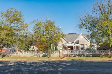 STANDERTON, SOUTH AFRICA - MAY 2, 2019: A street scene, with an historic house, in Standerton, in the Mpumalanga Provinceのeditorial素材