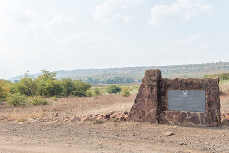 KRUGER NATIONAL PARK, SOUTH AFRICA - MAY 7, 2019: A memorial plaque at the Engelhard Dam in the...