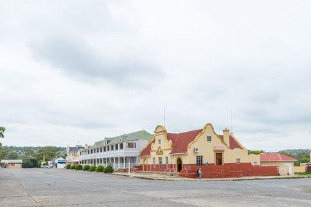 WINBURG, SOUTH AFRICA - MARCH 1, 2020: A street scene, with historic, old, buildings, in Winburg. A...