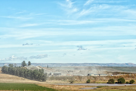 PHUTHADITJHABA, SOUTH AFRICA - MARCH 18, 2020:  A stone crusher plant next to road R712 near...