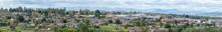 FICKSBURG, SOUTH AFRICA - MARCH 20, 2020: A panoramic view of Maputsoe in Lesotho as seen accross the Caledon River from Ficksburg in South Africaのeditorial素材