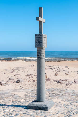 CAPE CROSS, NAMIBIA - JUNE 7, 2011: Replica of the cross planted by Diogo Cao in 1486 at Cape Cross, Namibiaのeditorial素材