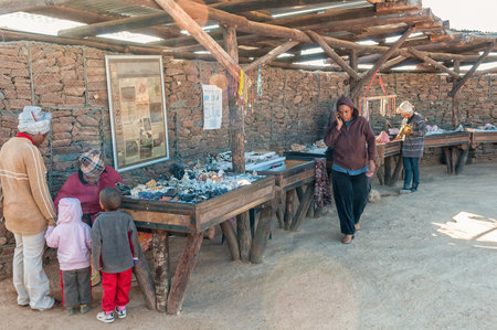 SPITZKOPPE, NAMIBIA - JUNE 18, 2012: Crystals and other semi-precious stones at the Uibi-Oas Crystal Market. Vendors are visibleのeditorial素材