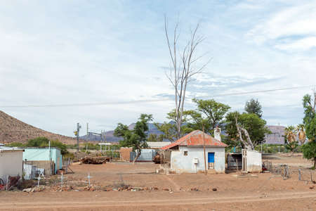 NELSPOORT, SOUTH AFRICA - APRIL 2, 2021: Buildings at the railroad station at Nelspoort in the Western Cape Karoo. Graves are visibleのeditorial素材