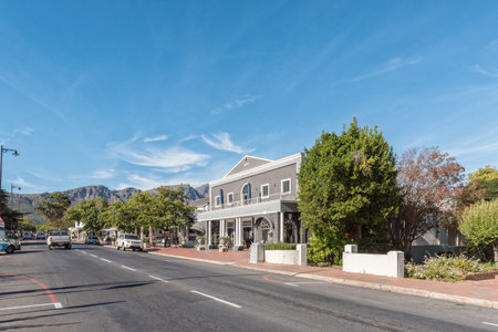 FRANSCHHOEK, SOUTH AFRICA - APRIL 12, 2021: A street scene, with businesses and vehicles, in Franschhoek in the Western Cape Provinceのeditorial素材