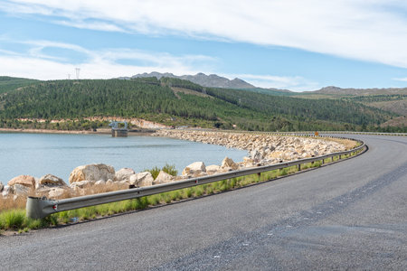 Road R43 crossing the Theewaterskloof dam wall near Villiersdorp in the Western Cape Provinceの写真素材
