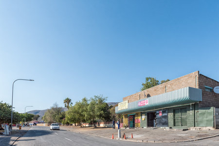 DE DOORNS, SOUTH AFRICA - APRIL 20, 2021: A street scene, with businesses, peoiple and a vehicle, in De Doorns in the Western Cape Provinceのeditorial素材