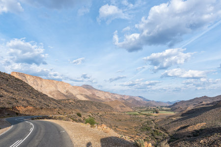 The view from the Kredouw Pass on road R407 into the Prince Albert Valley. The Swartberg Mountains...