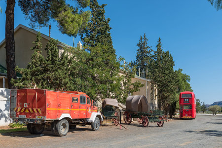 MATJIESFONTEIN, SOUTH AFRICA - APRIL 20, 2021: A street scene, with vintage vehicles, in the...