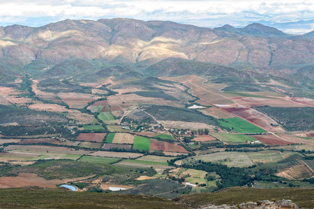 The farm landscape in the Matjies River Valley as seen from the Swartberg Pass near Oudtshoorn in the Western Cape Karooの写真素材