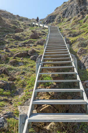 CAPE POINT, SOUTH AFRICA - DEC 23, 2021: Steps down to Diaz Beach at Cape Point. One person is visibleのeditorial素材