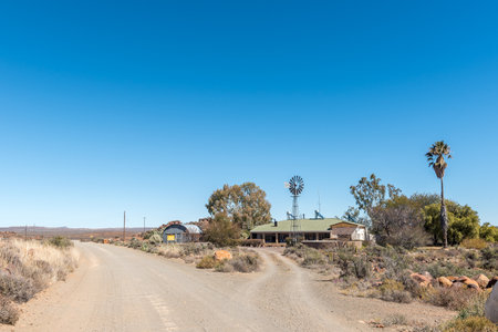 FRASERBURG, SOUTH AFRICA - SEP 3, 2022: Road landscape at Eselfontein Guest Farm on the historic Postal Route between Fraserburg and Sutherland in the Northern Cape Karooのeditorial素材