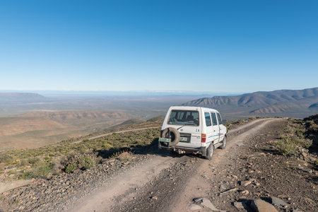 SUTHERLAND, SOUTH AFRICA - SEP 4, 2022: A vehicle is visible on the Ouberg Pass near Sutherland in the Northern Cape Provinceのeditorial素材