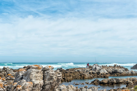 Agulhas National Park, South Africa - Sep 21, 2022: Anglers at the southern-most tip of Africa, Cape...