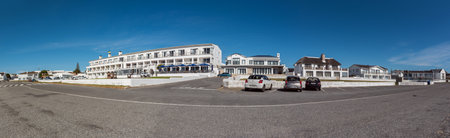 Arniston, South Africa - Sep 22, 2022: A street scene, with The Arniston Hotel, in Arniston in the Western Cape Province. Vehicles are visibleのeditorial素材