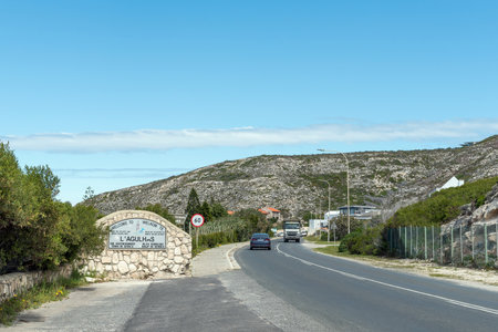 L'Agulhas, South Africa - Sep 22, 2022: Entrance to L'Agulhas, the southern most town in Africa. Vehicles are visibleのeditorial素材