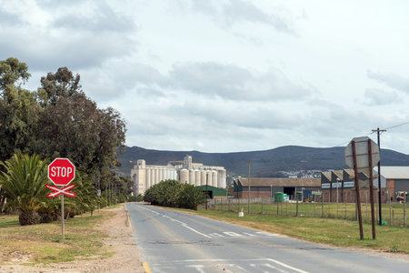 Bredasdorp, South Africa - Sep 23, 2022: View of Bredasdorp in the Western Cape Province as seen from road R319 to Swellendam. Grain silos are visibleのeditorial素材