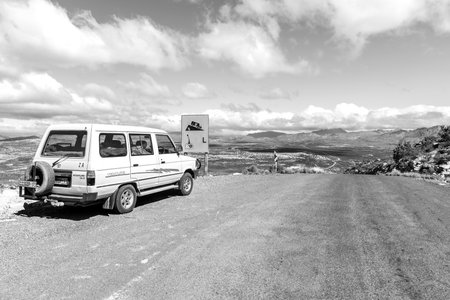 Cederberg, South Africa - Sep 4, 2022: Top of the Katbakkies Pass in the Western Cape Cederberg. A vehicle is visible. Monochromeのeditorial素材