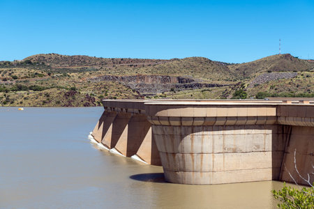 The Vanderkloof Dam overflowing. It is the second largest dam in South Africa. It has the tallest dam wall in South Africaの写真素材