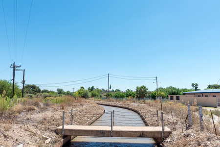 Pedestrian bridge over a canal in Groblershoop in the Northern Cape Provinceの写真素材